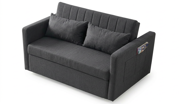 Un moderno sofá de dos plazas de tela gris oscuro con líneas limpias, dos cojines en el respaldo y un revistero en el reposabrazos. El diseño es elegante y funcional.