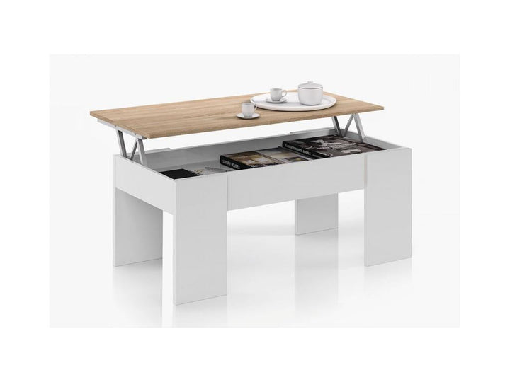 Mesa de centro moderna con una superficie de Cambria parcialmente levantada, que deja al descubierto un espacio de almacenamiento con libros. Sobre la superficie hay una tetera y una taza, lo que transmite funcionalidad.